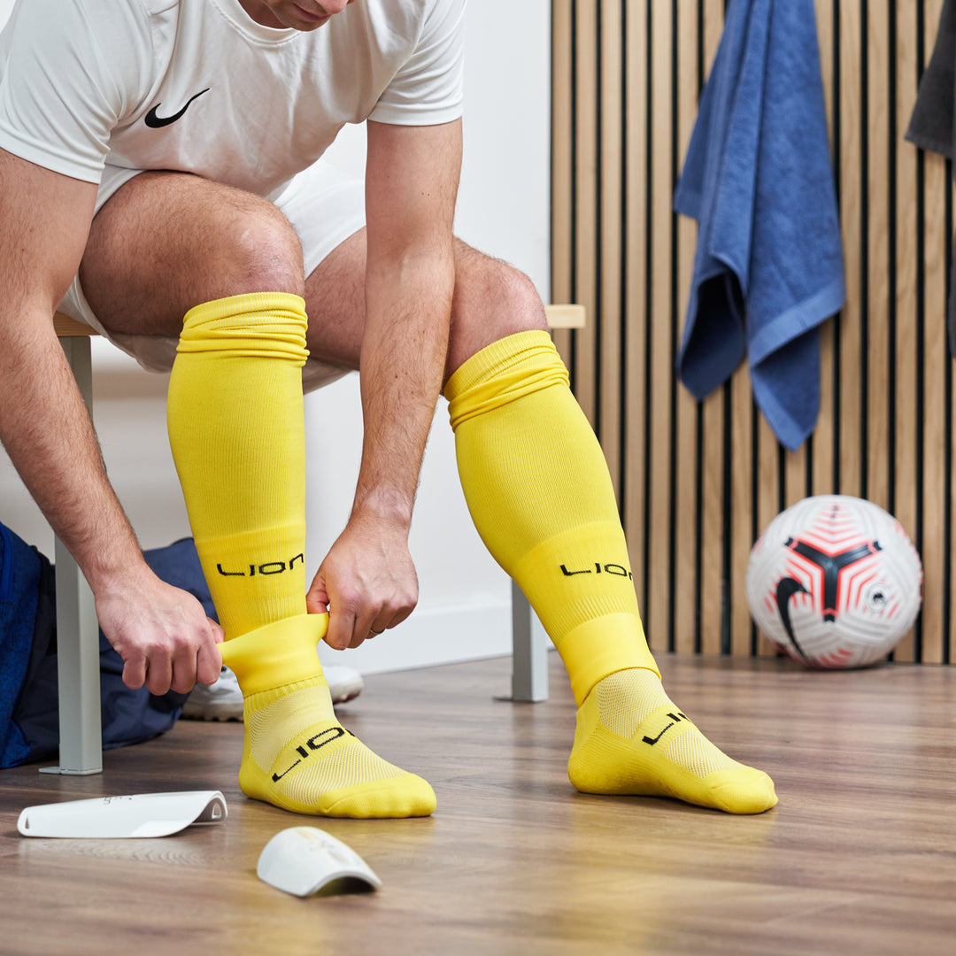 Yellow sleeve socks lion lifestyle 