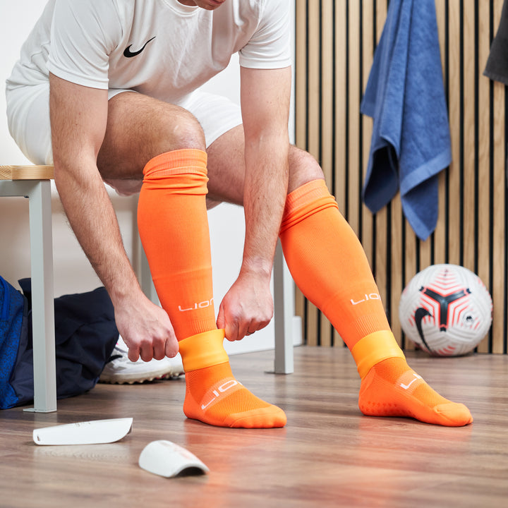 Orange sleeve socks lion lifestyle 