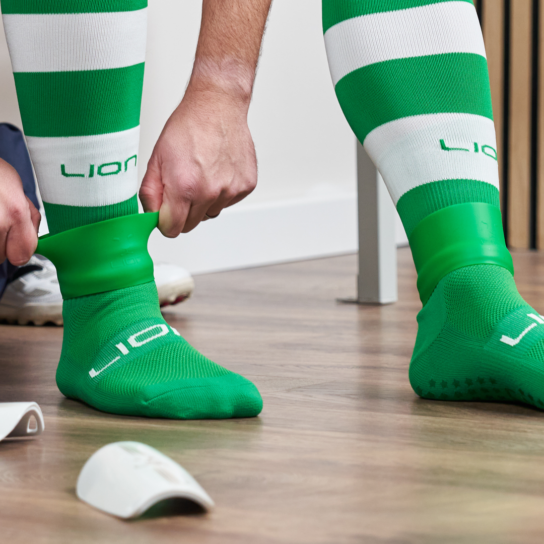 Lion grip sock green white stripes