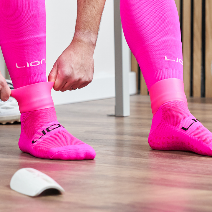 Pink silicone holder for shin pad