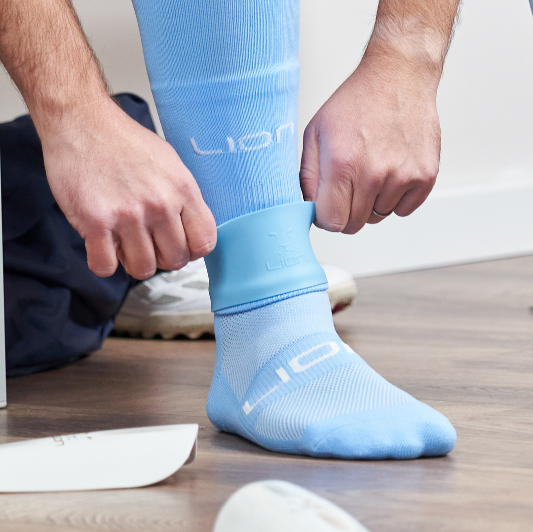 Sky blue silicone holder for shin pad